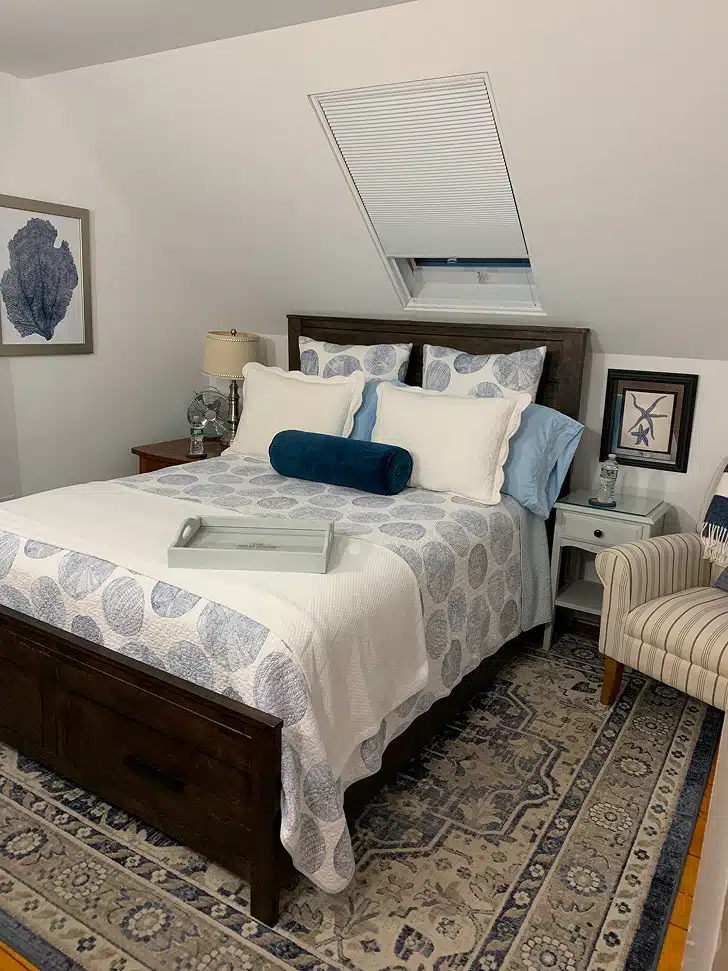 Cozy bedroom with blue accents.