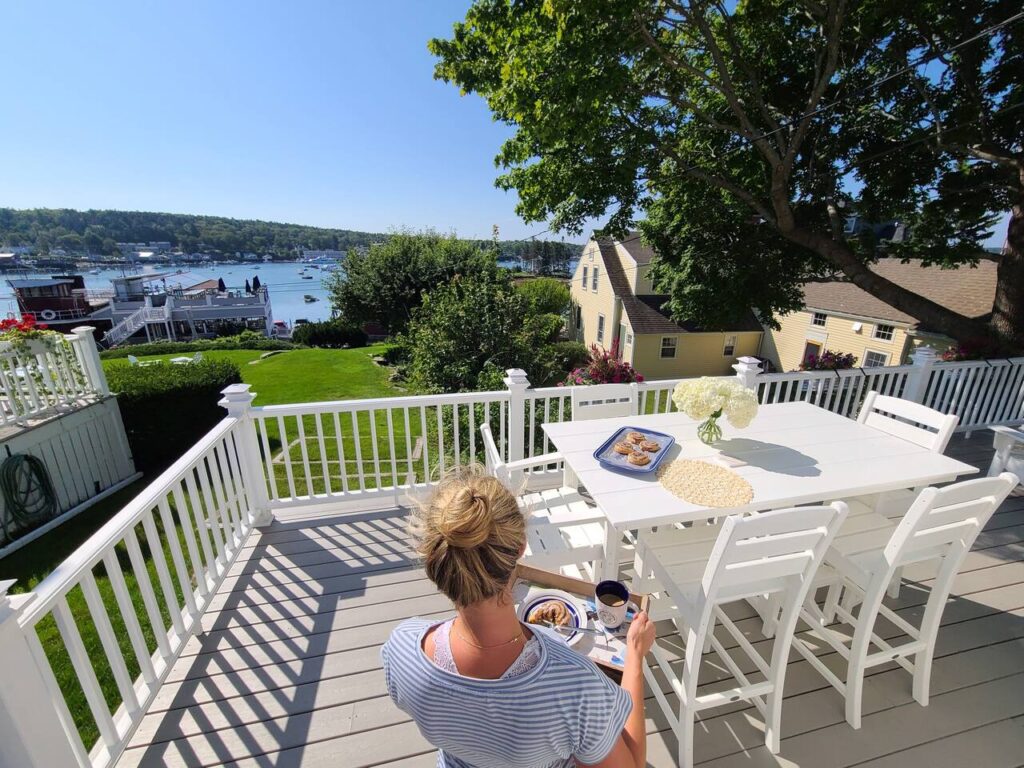 Outdoor dining with scenic waterfront view.