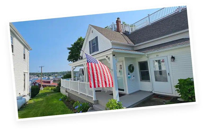 Charming house with American flag.