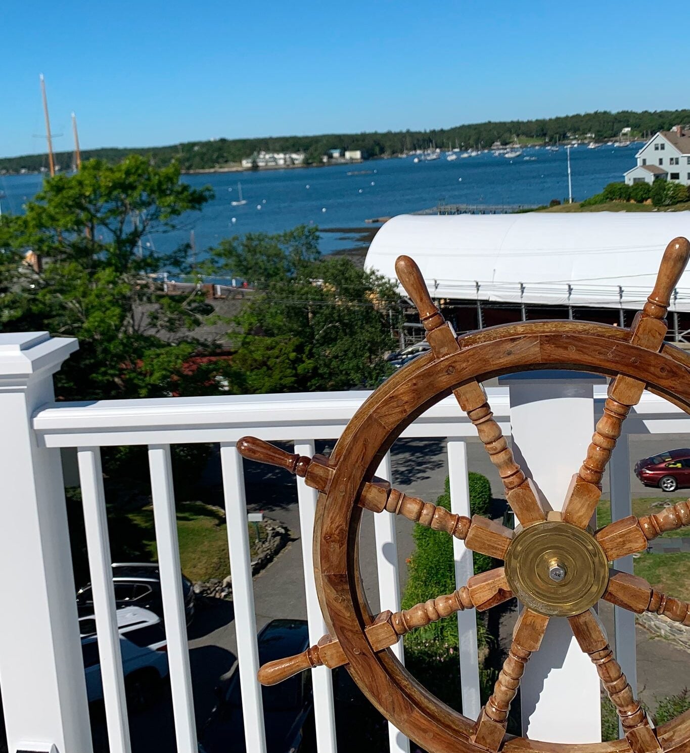Scenic view with ship's wheel