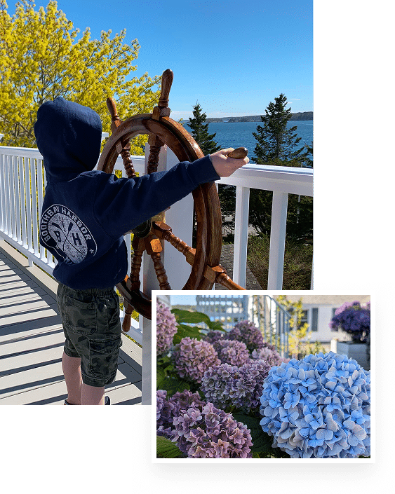 Child at ship's wheel, flowers nearby